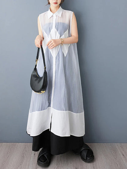 Stylish detail of the NYFS Plus Size Organya Splicing Sleeveless Casual Shirt Dress, featuring a sophisticated O-neck neckline and airy polyester fabric, designed for a comfortable and chic summer look.