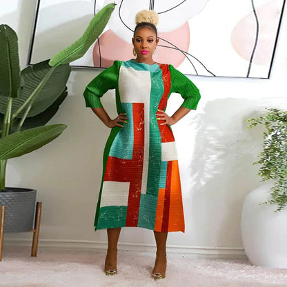 Sophisticated African Dashiki dress for women in classic army green, featuring a flattering O-Neck and pleated detailing.