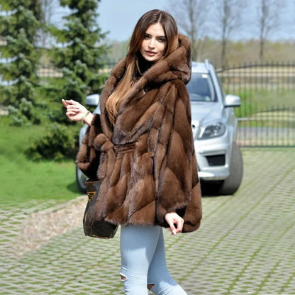 Stylish women's faux fur coat with a batwing sleeve design, ideal for chilly autumn and winter outings.