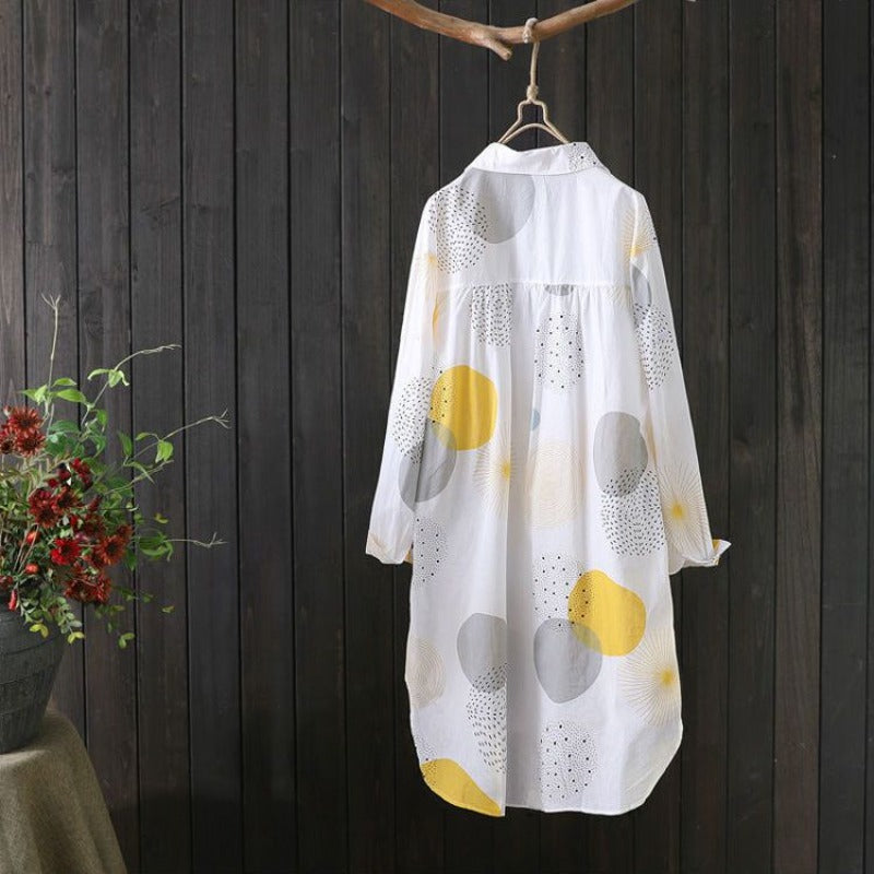 Close-up of the long sleeve women's blouse featuring intricate print details, enhancing the luxurious appeal for all seasons.