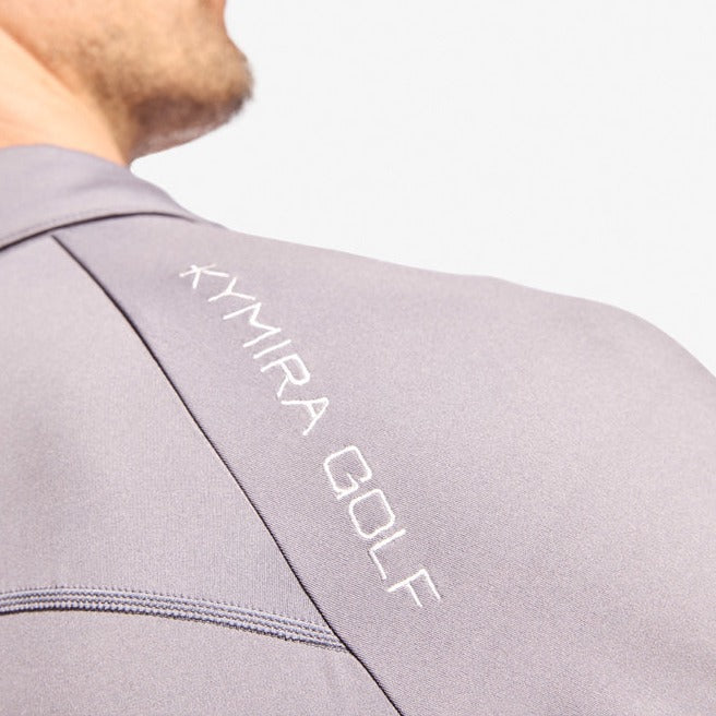 Flat lay of KYMIRA Men's Infrared Golf Polo Shirt in premium performance fabric, exemplifying luxury and modern golf fashion.