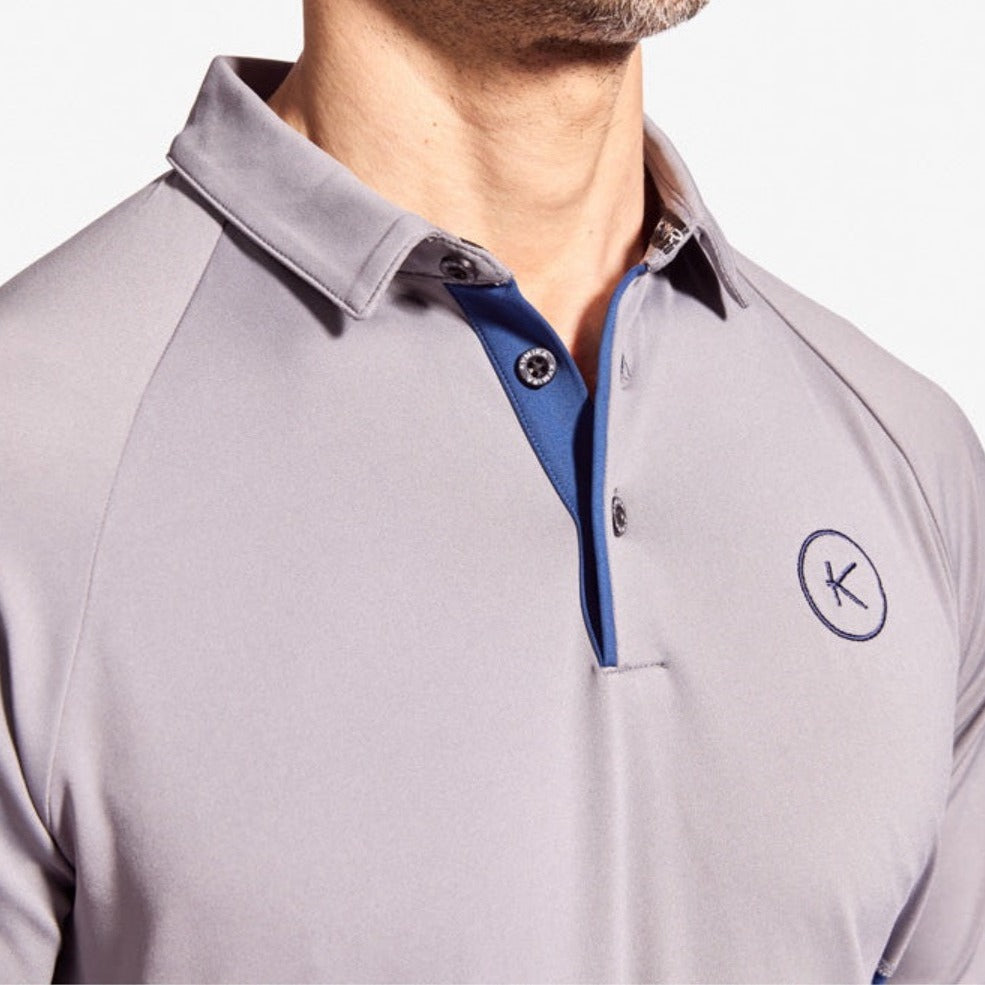 Close-up view of KYMIRA Men's Infrared Golf Polo Shirt highlighting luxurious design and high-quality materials for optimal comfort and performance.