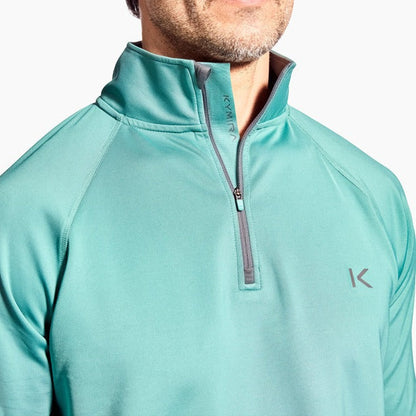Men's Kymira Infrared 1/4 Zip Top artfully arranged, showcasing the premium quality and advanced fabric technology for elevating performance.