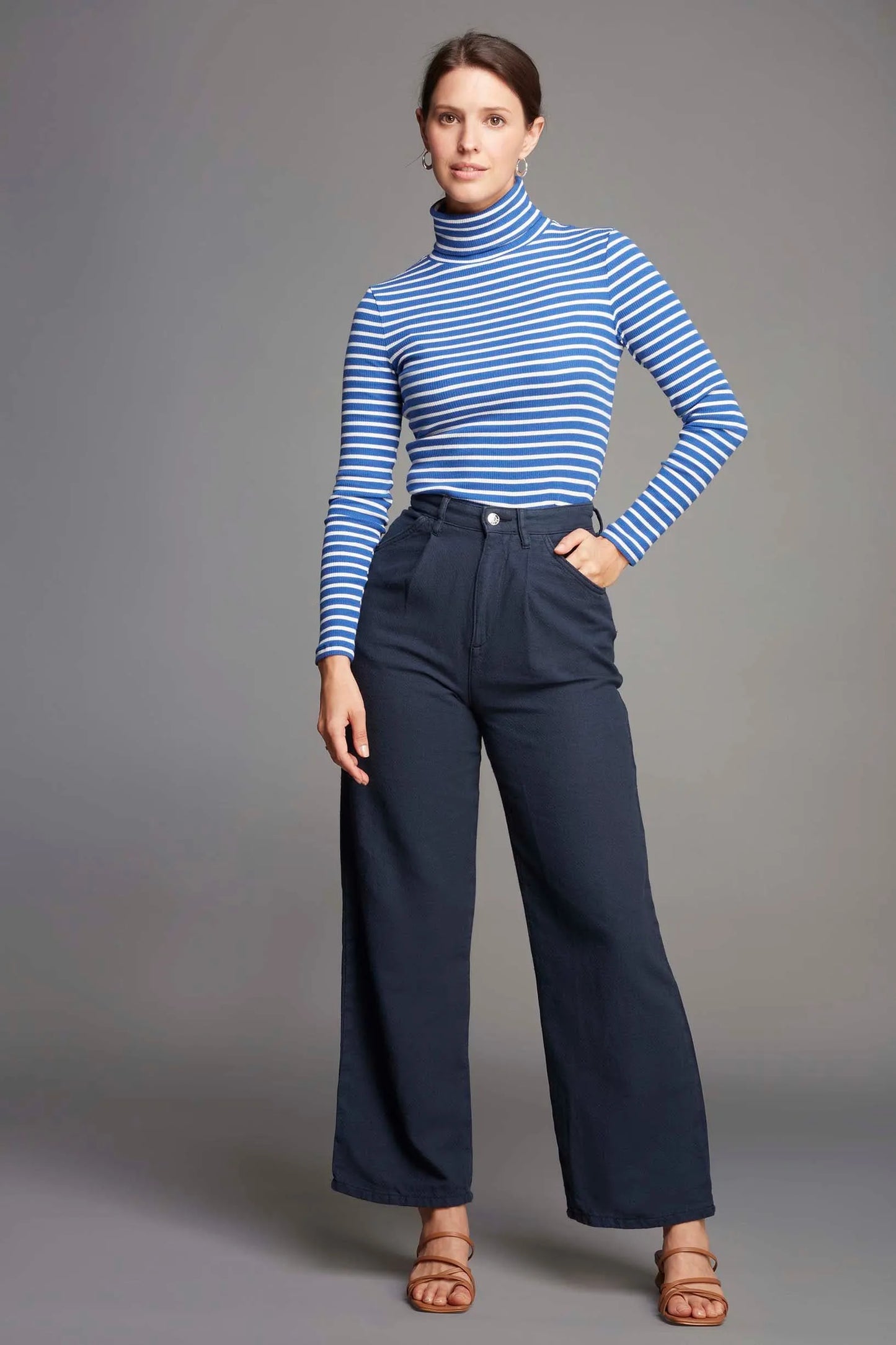 Versatile luxury women's long sleeve striped top, expertly crafted for a flattering fit and timeless style.