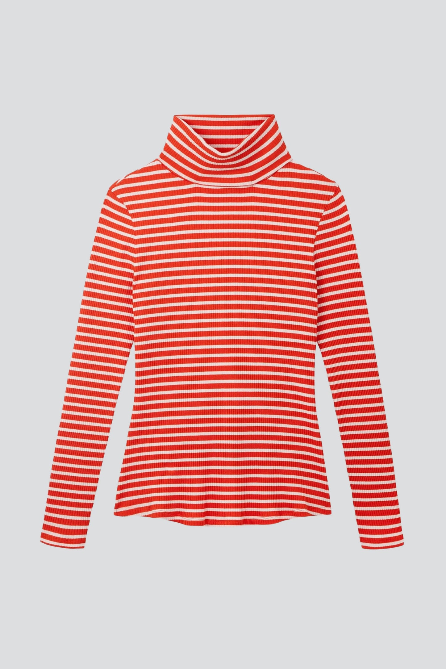 Detail shot of the polo neck and long sleeves of the luxury women's striped cotton top, showcasing comfort and elegance.