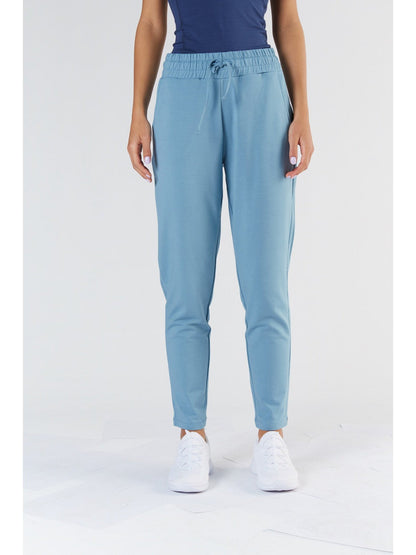 Stylish women's tencel sweatpants with an adjustable draw-cord waistband and practical front pockets, combining utility and chic design.