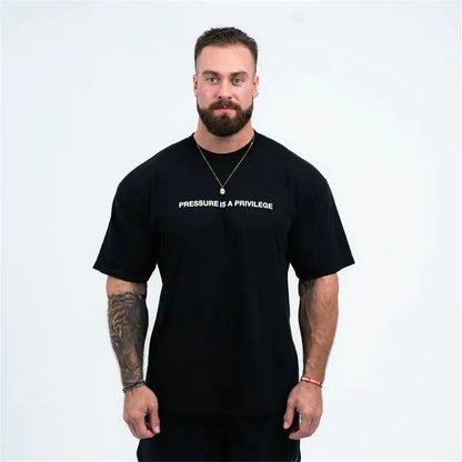 Close-up of the Men's Summer Gym Sports Tee from Dazzling Dreams Studio highlighting moisture-wicking technology for ultimate comfort.
