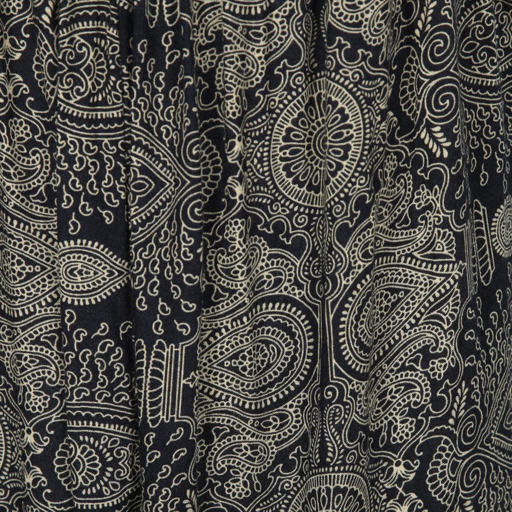 Close-up of the intricate mandala patterns on the soft rayon cami jumpsuit, highlighting the vibrant fabric and elegant drape.