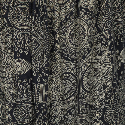 Close-up of the intricate mandala patterns on the soft rayon cami jumpsuit, highlighting the vibrant fabric and elegant drape.