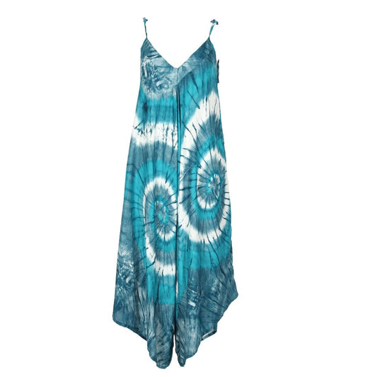 Elegant tie dye print wide leg cami jumpsuit in vibrant tropical ocean blues, showcasing dramatic spiral patterns, perfect for luxurious summer holiday attire.