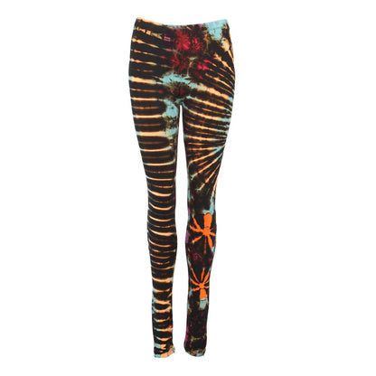 Model wearing colourful tie-dye yoga leggings, showcasing a chic and trendy look for layering.