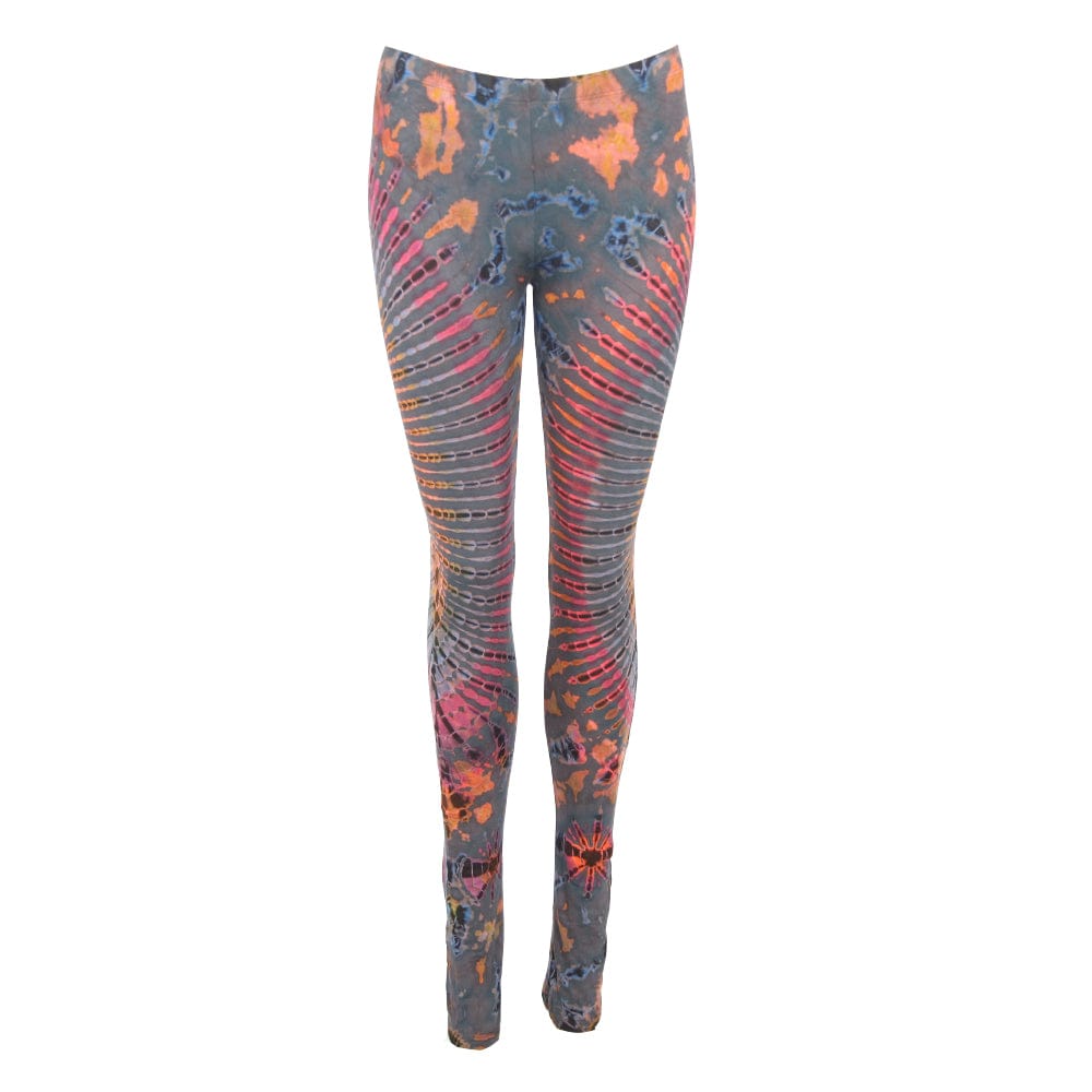 Stylish tie-dye yoga leggings paired with a hippy skirt, illustrating the perfect outfit for festivals.