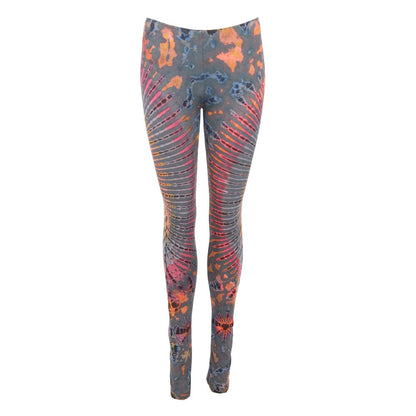 Stylish tie-dye yoga leggings paired with a hippy skirt, illustrating the perfect outfit for festivals.