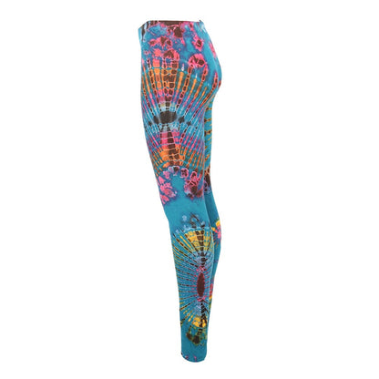 Close-up of high-quality stretch fabric of vibrant tie-dye yoga leggings, offering exceptional comfort and style.