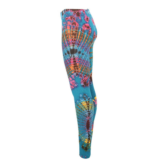 Close-up of high-quality stretch fabric of vibrant tie-dye yoga leggings, offering exceptional comfort and style.