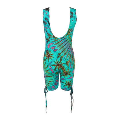 Model wearing luxury tie dye bodycon romper playsuit styled with trendy sandals, demonstrating versatile fashion options.