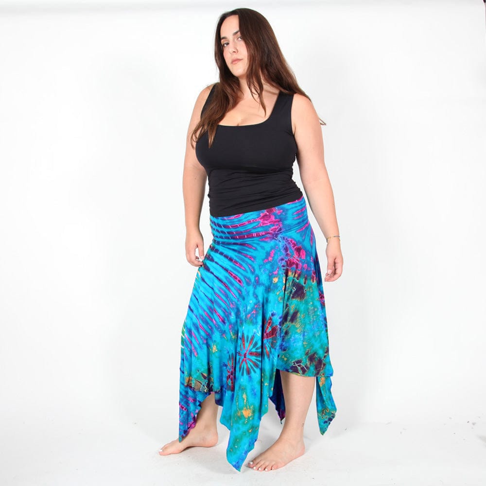 Full view of the trendy Floaty Tie Dye Midi Skirt worn by a model, demonstrating its unique hanky hem and dynamic colours for a chic look.