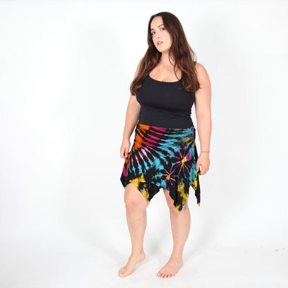 Chic close-up of a unique tie dye mini skirt with layered hanky hem, revealing rich textures and color variations, embodies luxury summer fashion.