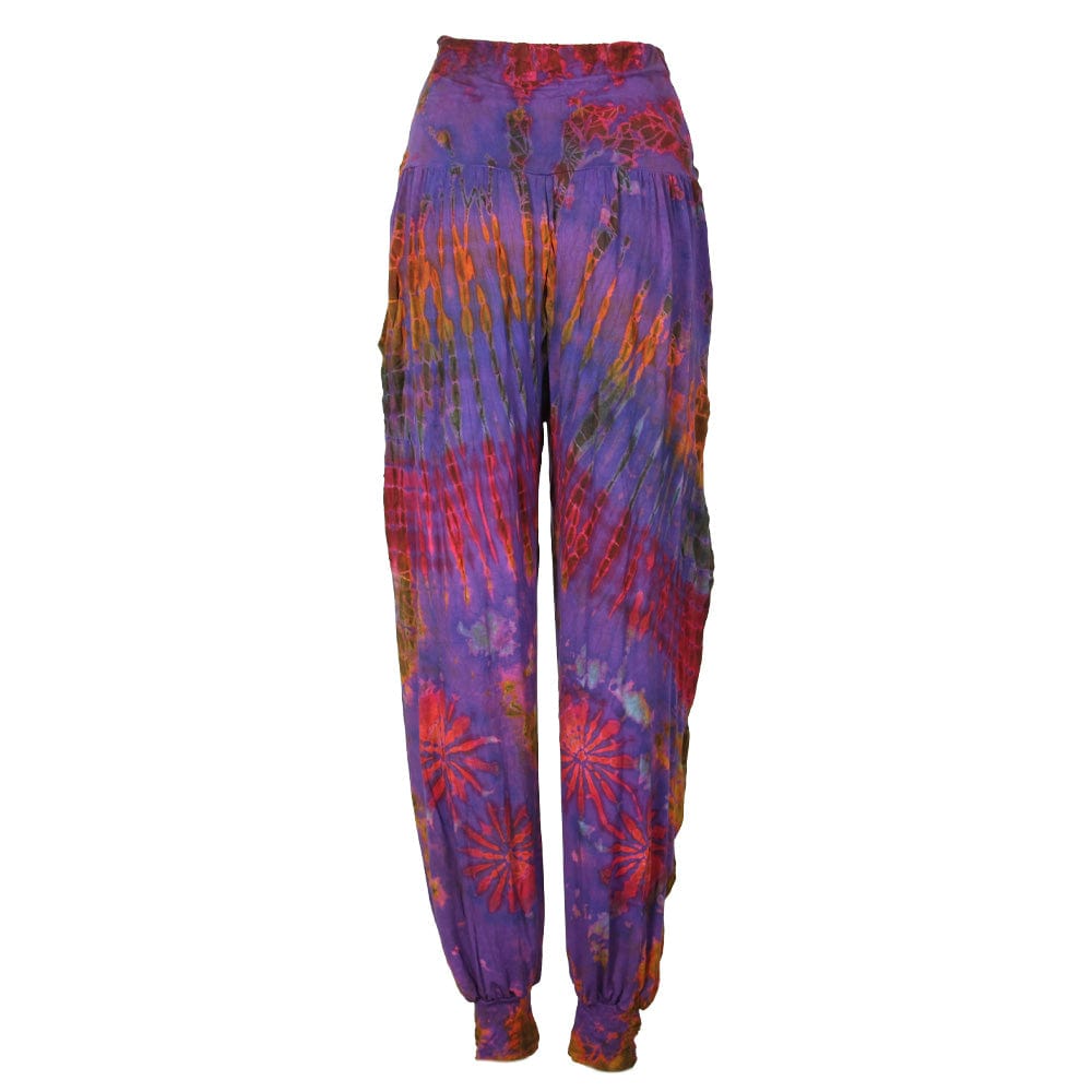 Vivid turquoise tie dye harem pants highlighting a stunning high waist and spacious pockets, ideal for fashion-forward looks.