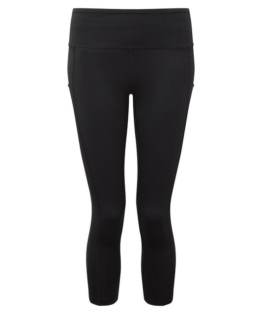 Elegant women's 3/4 length recycled performance leggings by Earth Wardrobe featuring a soft second skin fit and hidden pockets.