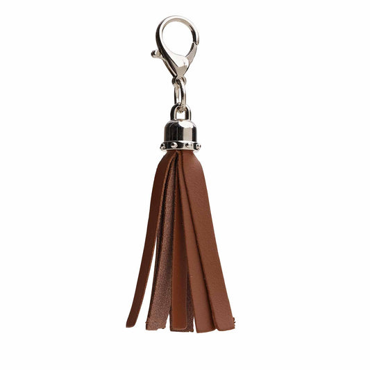 Luxurious Handcrafted Chestnut Mini Tassel Bag Charm in premium leather, showcasing elegance and quality craftsmanship. Perfect accessory for handbags and keys.