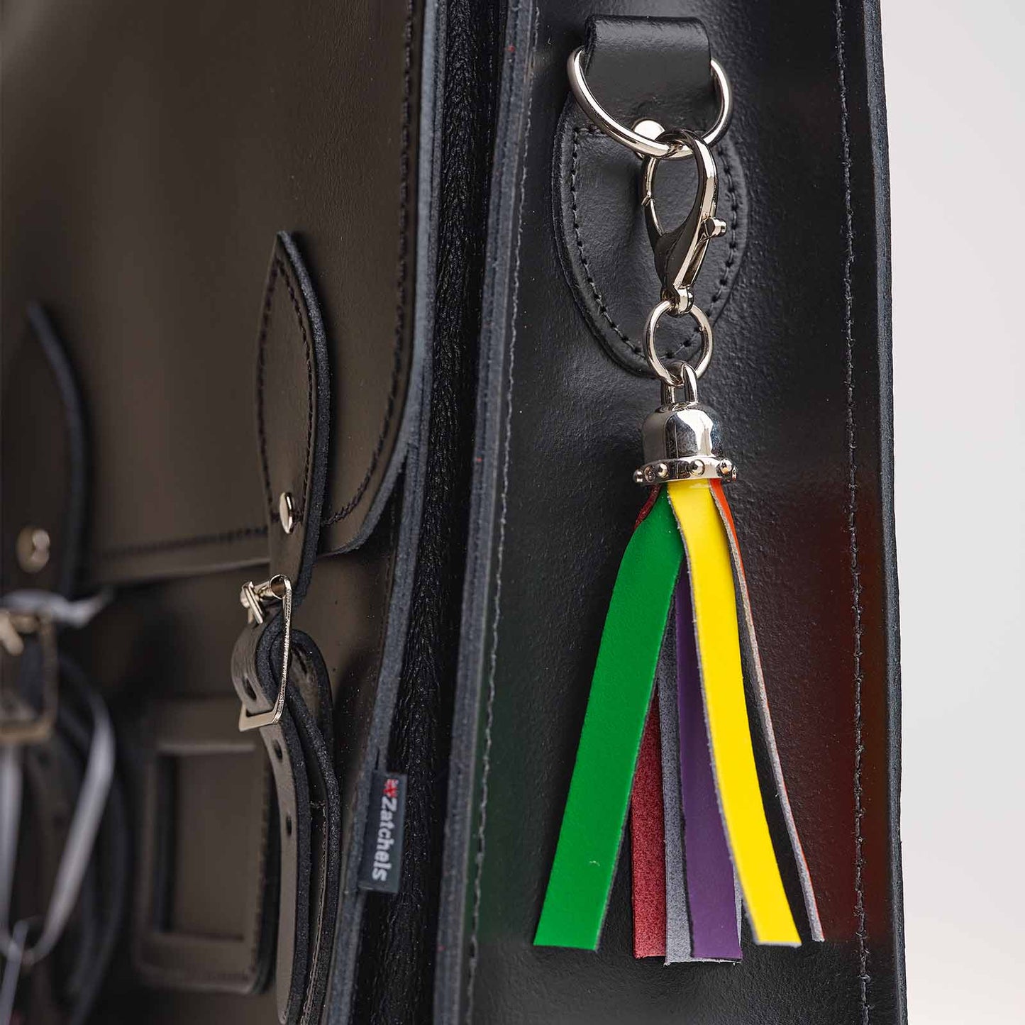 Hand-crafter premium leather mini tassel bag charm in Pride colours, elegantly designed by Zatchels, perfect for personalising bags and accessories.
