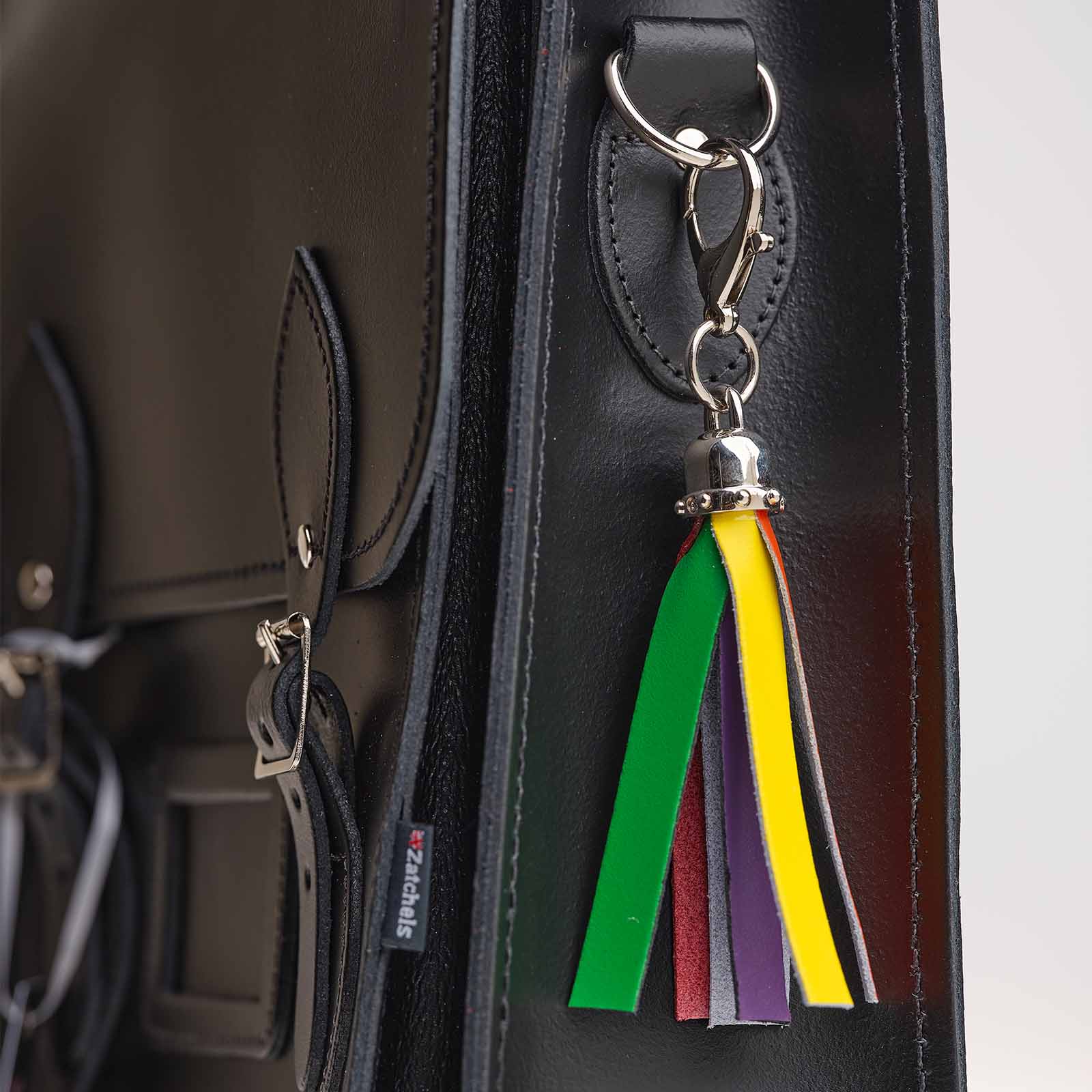 Hand-crafter premium leather mini tassel bag charm in Pride colours, elegantly designed by Zatchels, perfect for personalising bags and accessories.