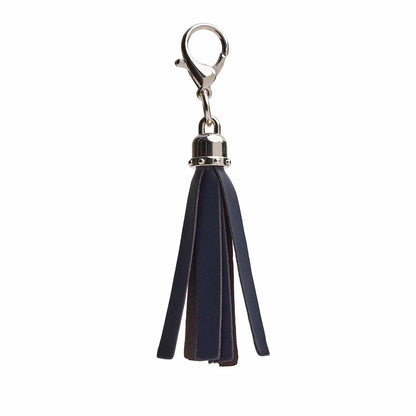 Luxury Hand-Crafted Mini Tassel Bag Charm by Zatchels in navy leather, elegantly designed to enhance any handbag or keychain.