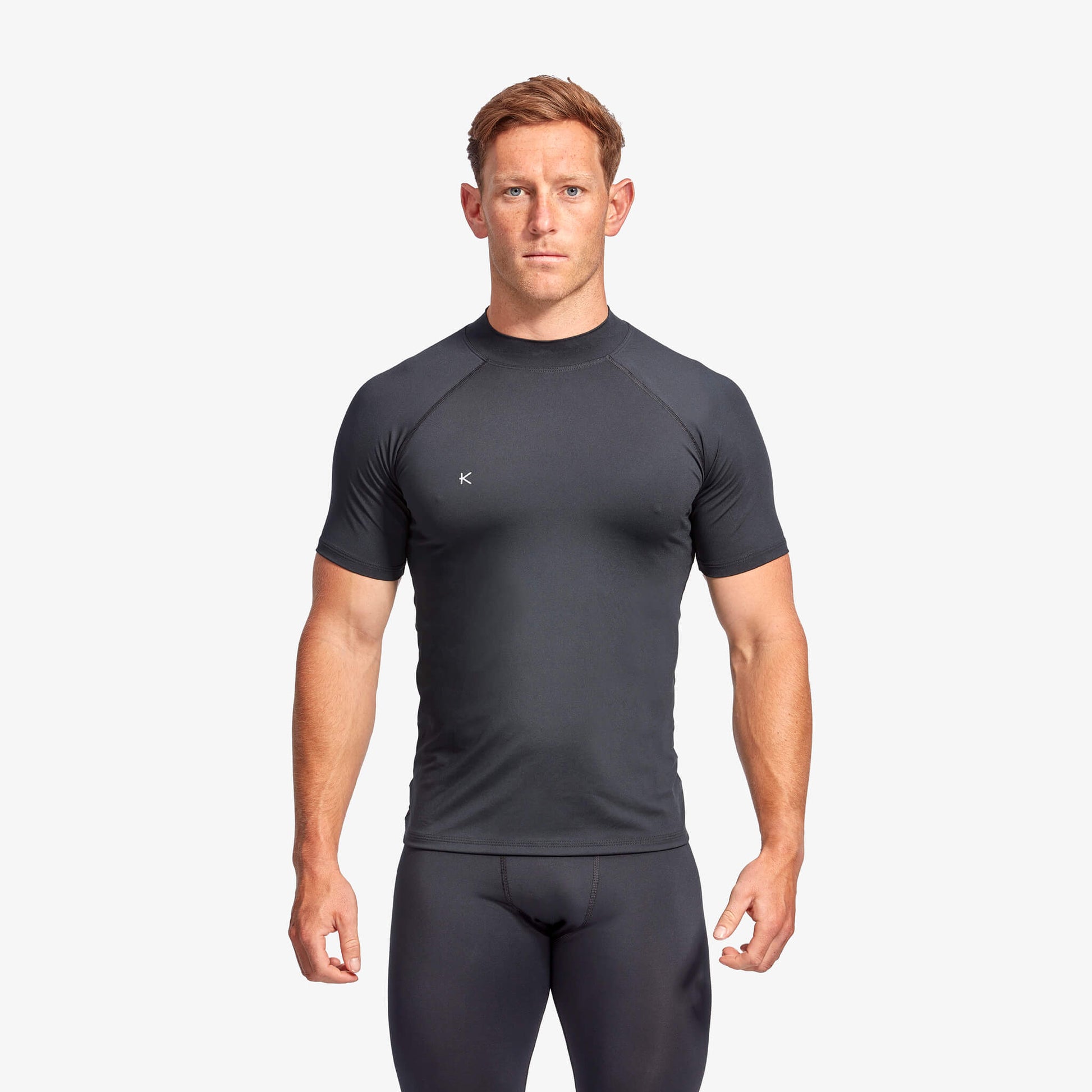 Elegantly crafted KYMIRA Men's Infrared Recovery Training Baselayer Top Short Sleeve, showcasing its ergonomic fit and durability in a sophisticated presentation.