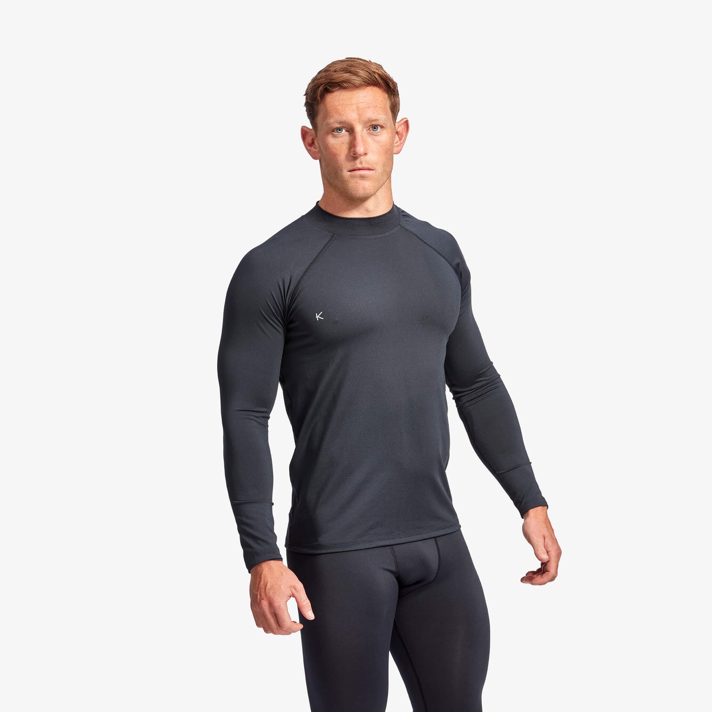 Luxurious KYMIRA Men's Long Sleeve Infrared Recovery Baselayer in a sleek ergonomic design, offering enhanced comfort and performance for training.