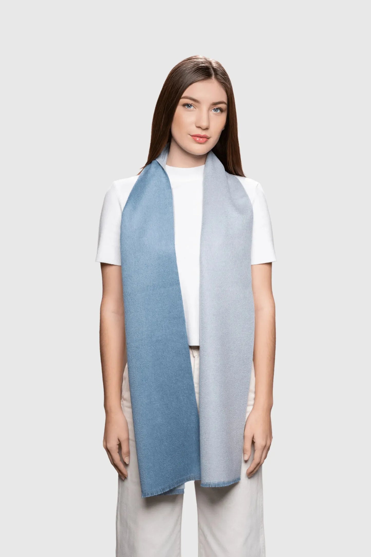 Chic and soft baby alpaca reversible scarf perched on a stylish backdrop, highlighting its beauty and functional design as a perfect winter accessory.