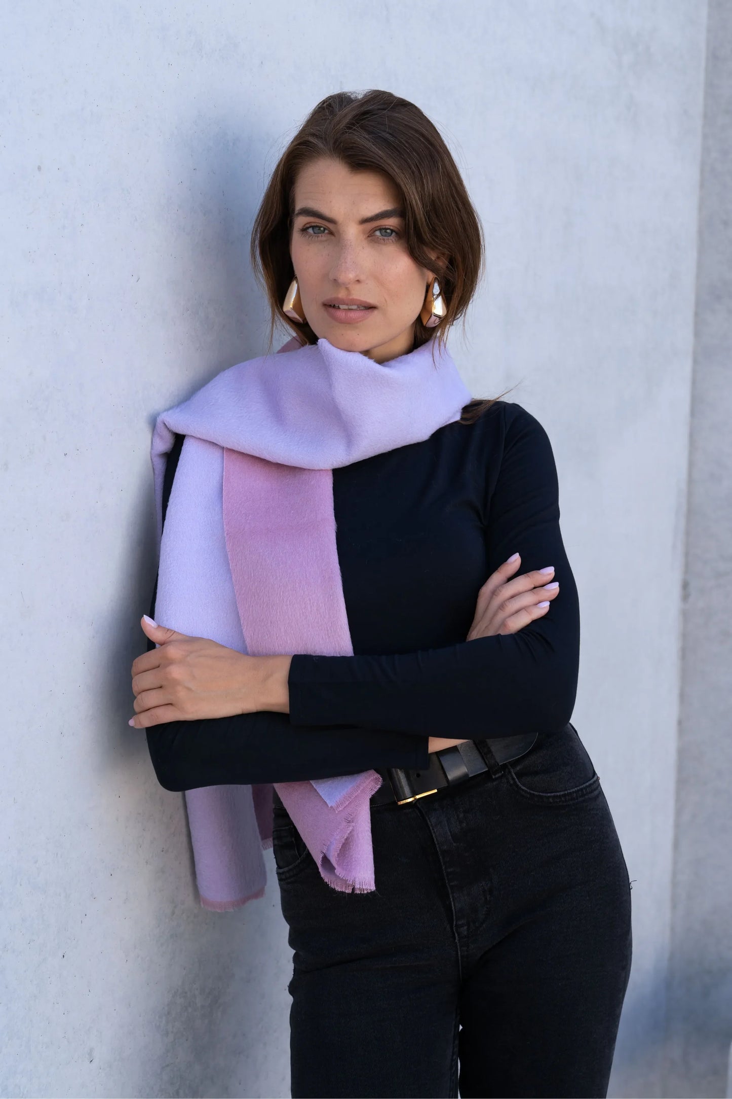 Luxurious two tone baby alpaca reversible scarf with frayed edges, showcasing intricate craftsmanship and soft textures, perfect for enhancing any wardrobe.