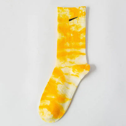 Luxurious Women's Tie-Dye Middle Tube Socks in sunny yellow, emphasizing stylish cotton texture and unique design for fashionable all-day wear.