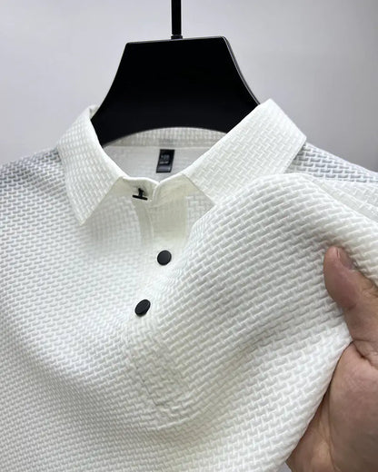 Men's AirElegance Polo Tee by Dazzling Dreams Studio, showcasing its advanced moisture-wicking fabric and sophisticated design in a professional setting.