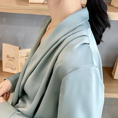 Detailed view of the criss-cross neckline on the Satin Blouse, highlighting unique design elements by Dazzling Dreams Studio.