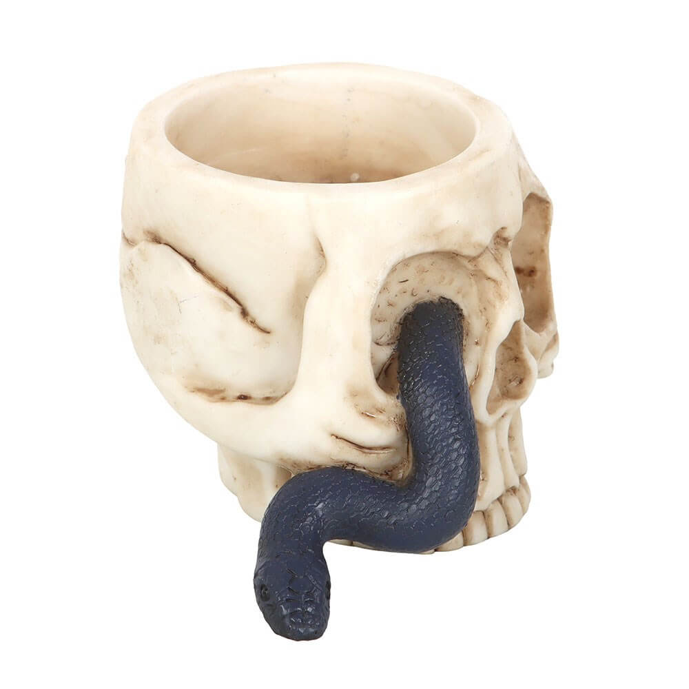 Luxurious gothic skull tealight holder entwined with a serpent, ideal for creating a dramatic and mysterious home ambience.