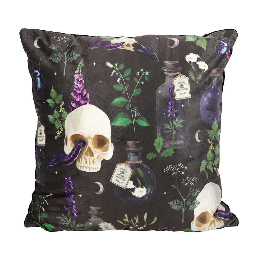 Gothic Venom & Vines cushion featuring an intricate skull and serpent design, elegantly displayed in a stylish interior setting.