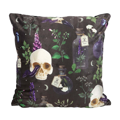 Gothic Venom & Vines cushion featuring an intricate skull and serpent design, elegantly displayed in a stylish interior setting.