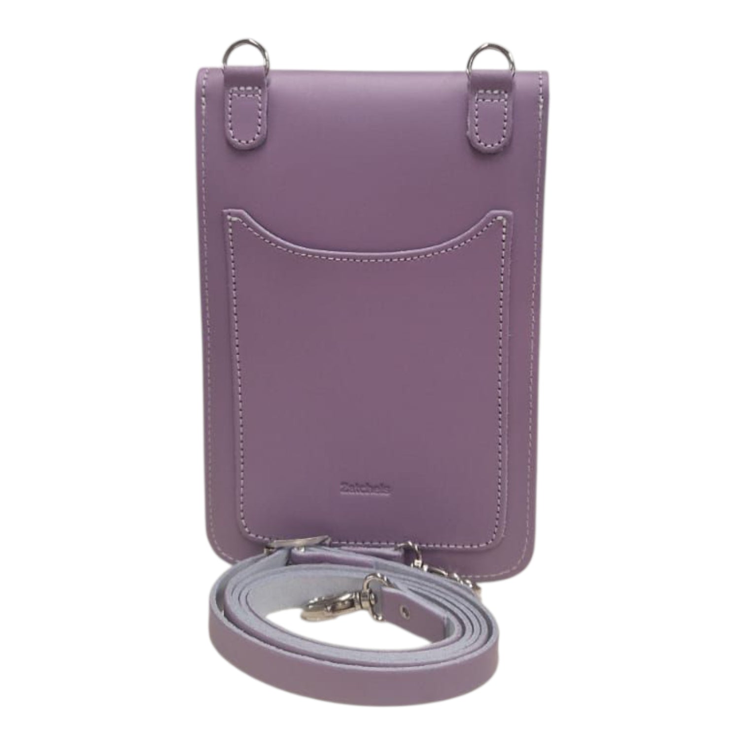 Stylish model wearing the Zatchels Luxury Handmade Leather Mobile Phone Pouch with an adjustable strap, demonstrating its elegant versatility for day or night outings.