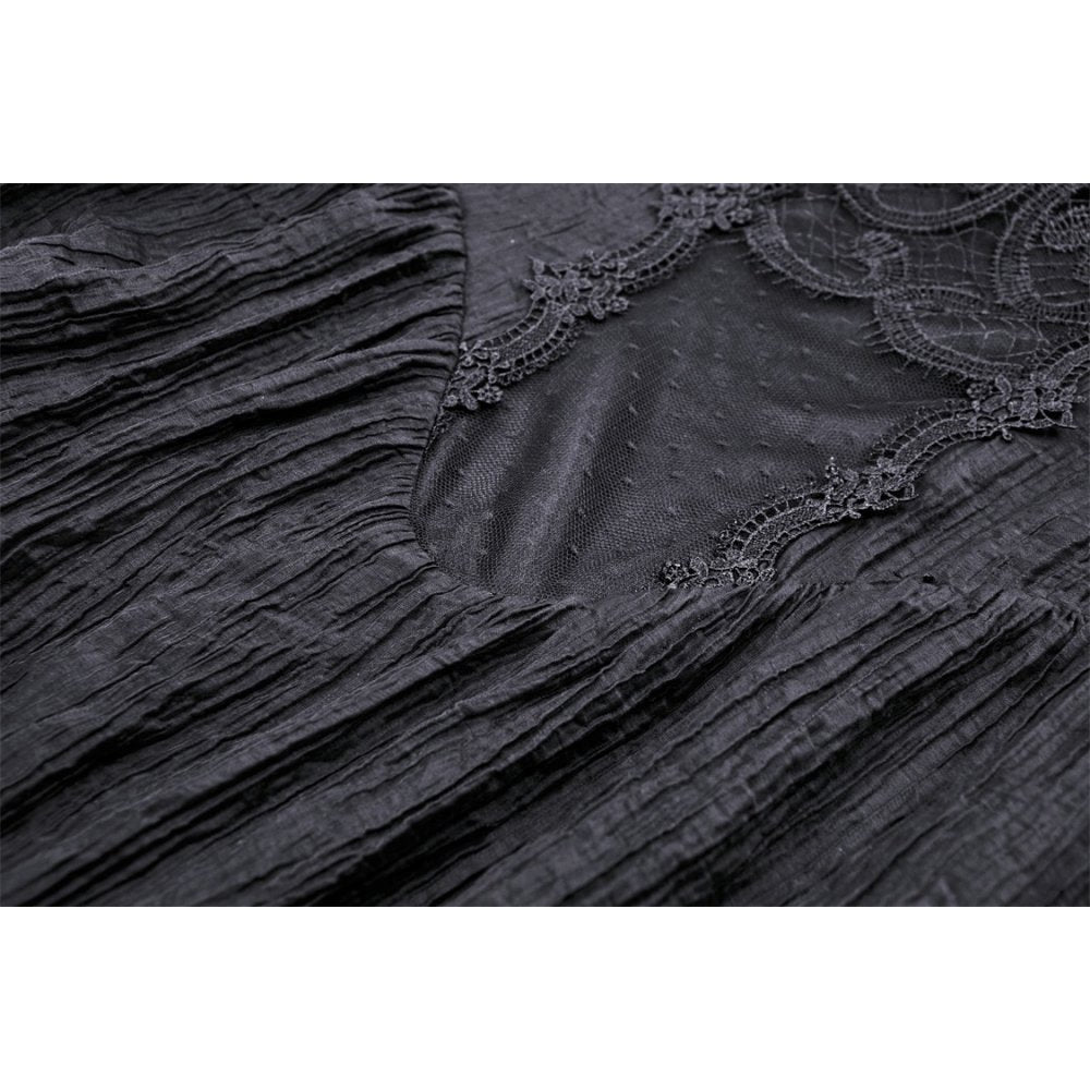 Model wearing the Dark In Love Vidonia High Neck Dress in a chic setting, embodying punk rock elegance with its stylish silhouette.