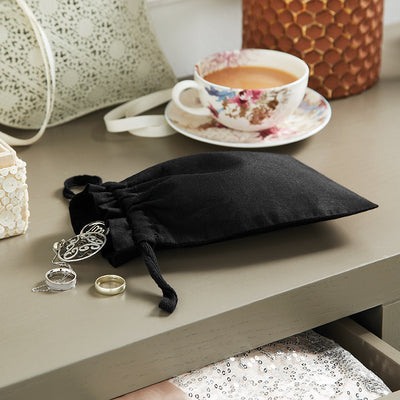 Luxurious Organic Cotton Drawcord Bag available in multiple sizes XS to L, ideal for stylish and sustainable living.