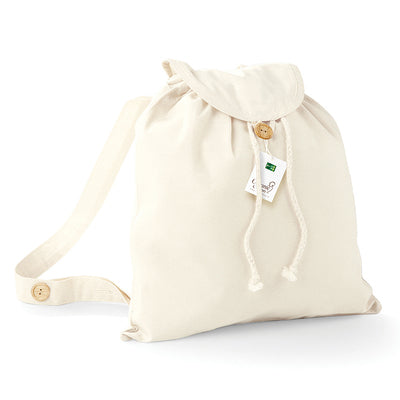 Sustainable Organic Cotton Backpack showcasing manual craftsmanship with wooden buttons and drawcord closure, perfect for stylish, eco-conscious outings.
