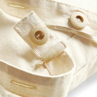 Artisanal organic cotton backpack demonstrating premium quality and aesthetic appeal, a perfect accessory for luxury outdoor adventures.