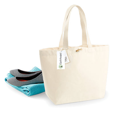 Luxury Earthaware Organic Marina Tote Bag crafted from eco-friendly cotton, featuring a natural wooden toggle closure and webbing carry handles, showcasing its premium heavyweight fabric in a stylish design.