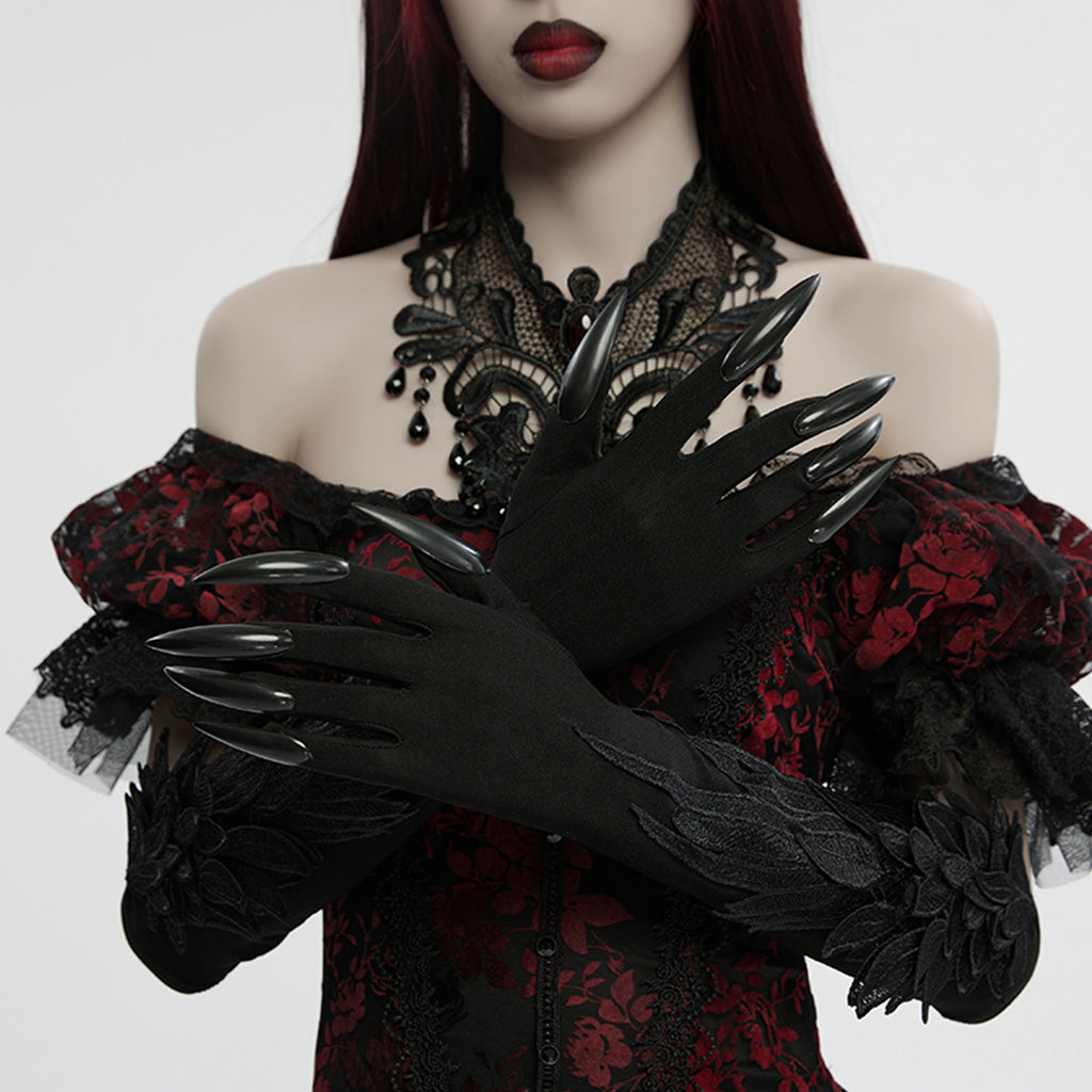 Artistic display of Punk Rave Alectrona Gothic Claw Gloves against a dark backdrop, highlighting their striking design and unique gothic allure.