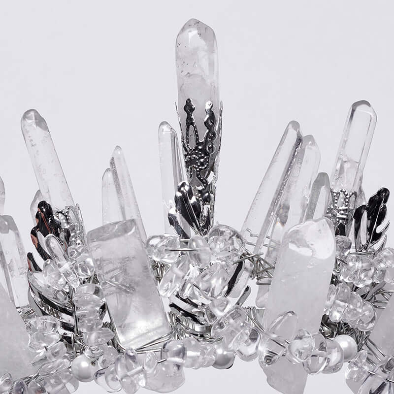 Fashion model wearing Punk Rave handcrafted white crystal headband, radiating elegance and rebellious charm.