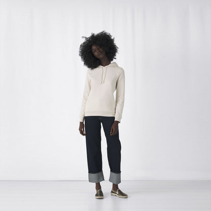 Luxury women's organic essential hoodie crafted from 80% organic cotton in vibrant blue, eco-friendly fashion.