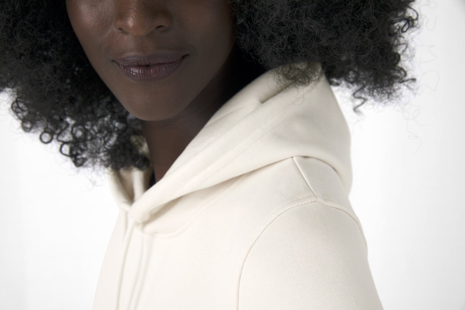 Chic women's organic hoodie available in earthy green, made from sustainable materials for an eco-conscious wardrobe.