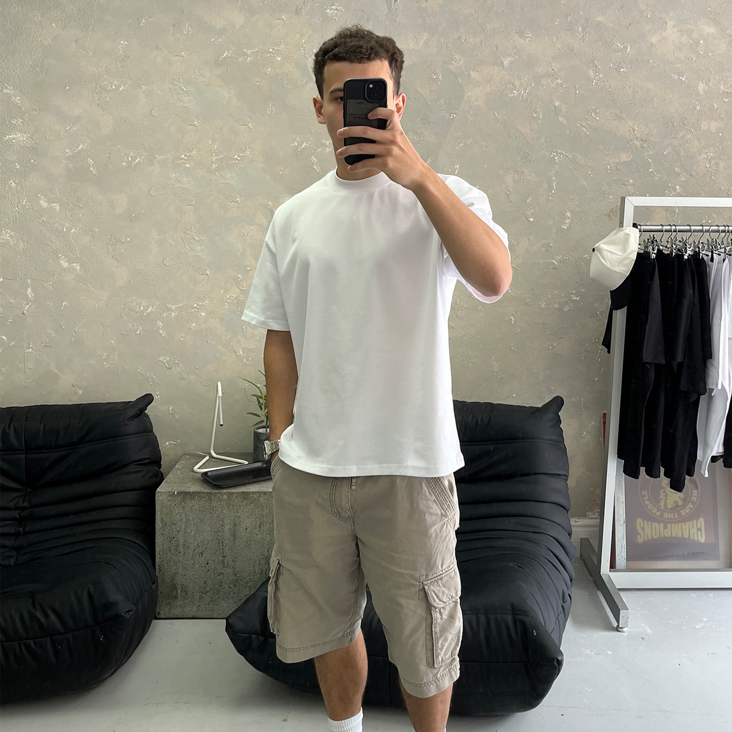 Elegant heavyweight white blank tee from FROST, featuring an oversized boxy fit and dropped shoulders for ultimate comfort.