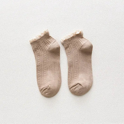 Elegant presentation of Dazzling Dreams Studio's Kawaii Frilly Ruffle Socks, ideal for both casual and formal wear, embodying a delightful Lolita aesthetic.